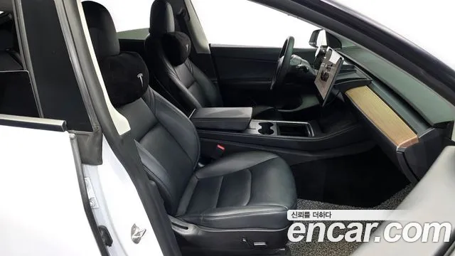 Tesla Model Y — Фото автомобиля 11