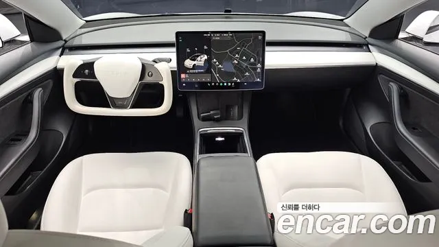 Tesla Model 3 — Фото автомобиля 8