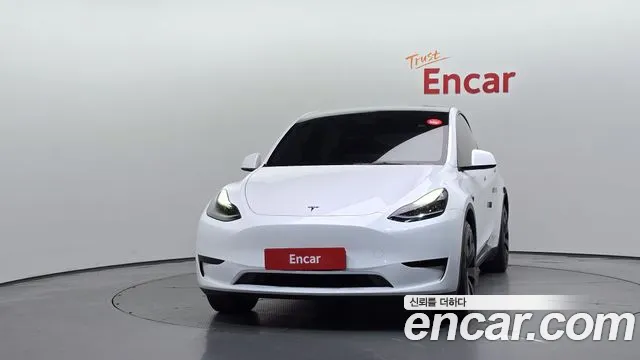 Tesla Model Y — Фото автомобиля 3
