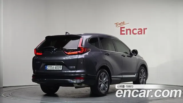 Honda CR-V CR-V 5-е поколение 2.0 гибрид Touring 4WD — Фото автомобиля 2
