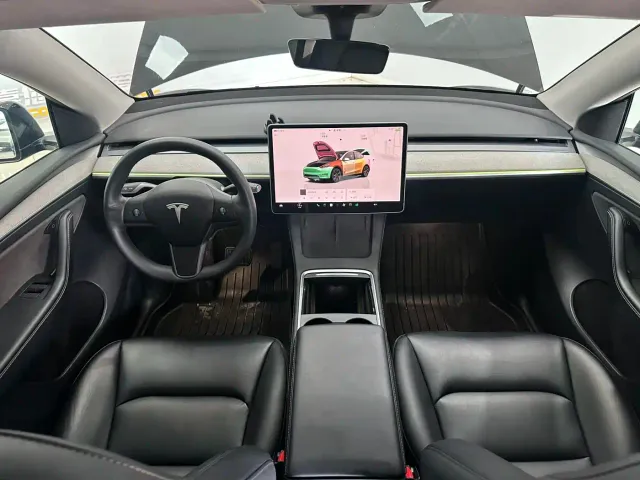 Tesla Model Y — Фото автомобиля 7