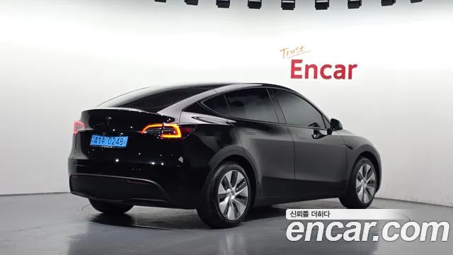 Tesla Model Y — Фото автомобиля 2