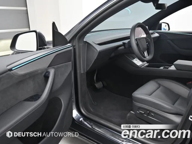 Tesla Model Y — Фото автомобиля 15