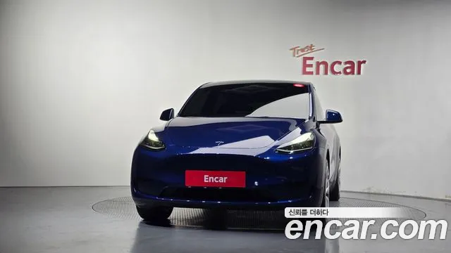 Tesla Model Y — Фото автомобиля 3