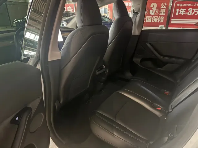 Tesla Model Y — Фото автомобиля 9