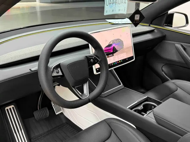 Tesla Model Y — Фото автомобиля 9