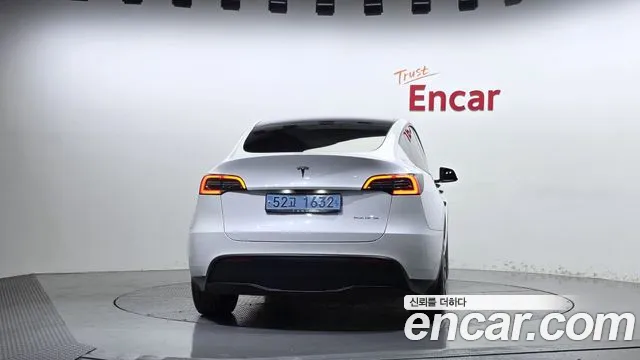 Tesla Model Y — Фото автомобиля 4