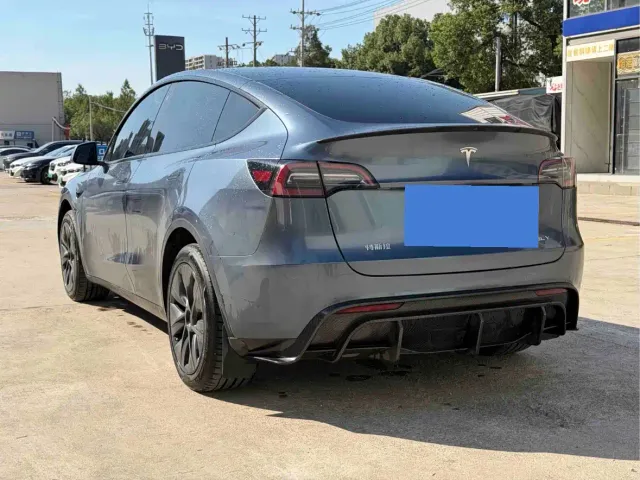 Tesla Model Y — Фото автомобиля 8
