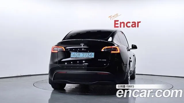 Tesla Model Y — Фото автомобиля 4