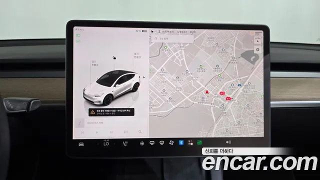 Tesla Model Y — Фото автомобиля 11