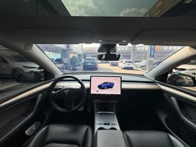 Tesla Model Y — Фото автомобиля 7