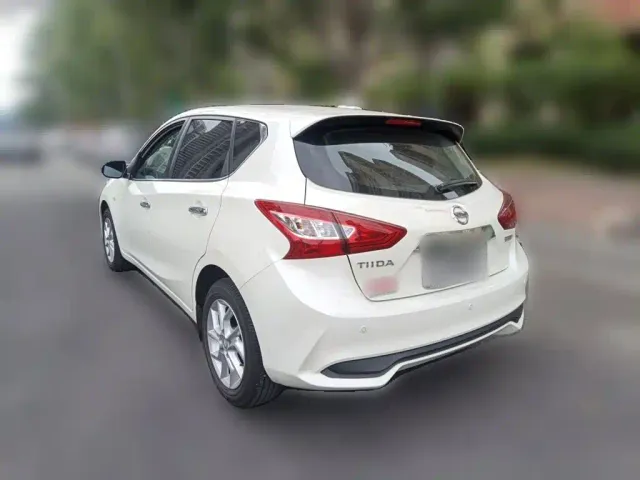 Nissan Tiida — Фото автомобиля 24