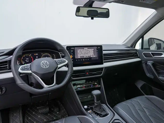 Volkswagen Tiguan L — Фото автомобиля 6