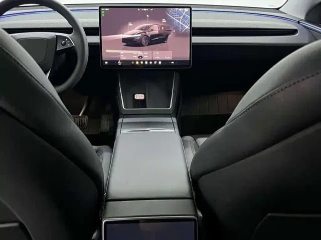 Tesla Model Y — Фото автомобиля 10
