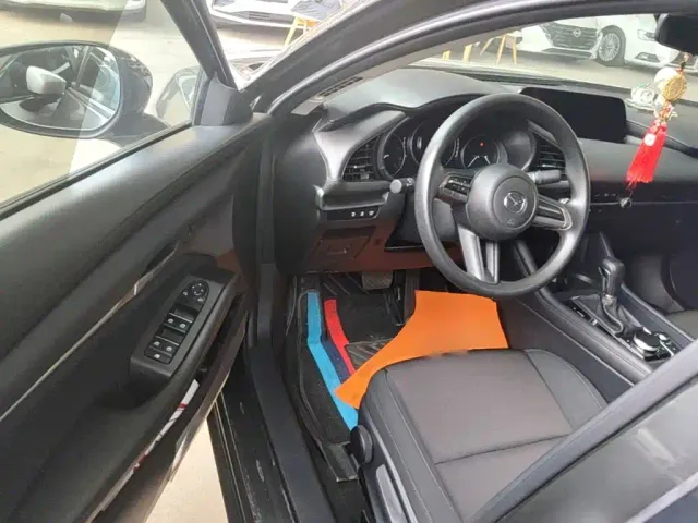 Mazda Axela — Фото автомобиля 15