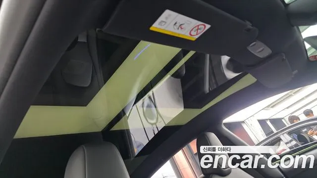 Tesla Model Y — Фото автомобиля 23