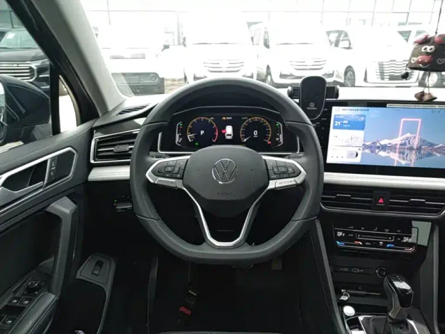 Volkswagen Tiguan L — Фото автомобиля 10