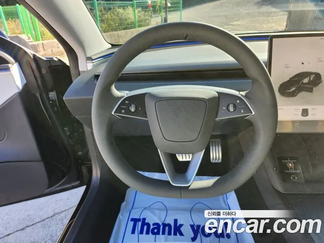 Tesla Model 3 — Фото автомобиля 10