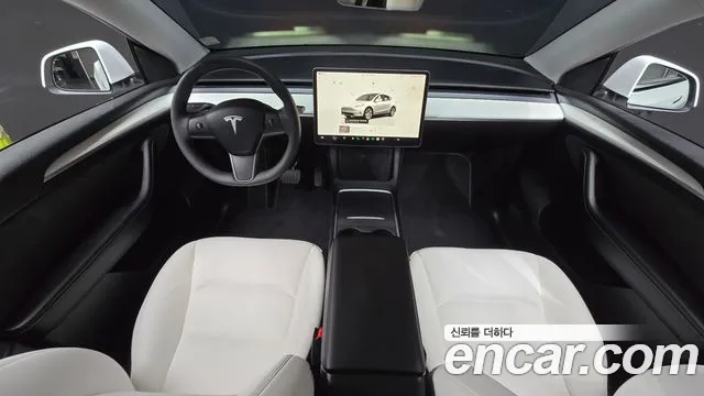 Tesla Model Y — Фото автомобиля 10