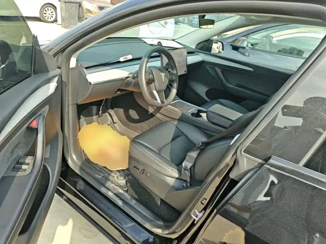 Tesla Model Y — Фото автомобиля 15