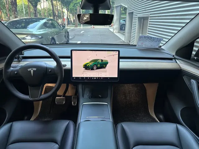 Tesla Model Y — Фото автомобиля 7