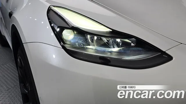 Tesla Model Y — Фото автомобиля 7