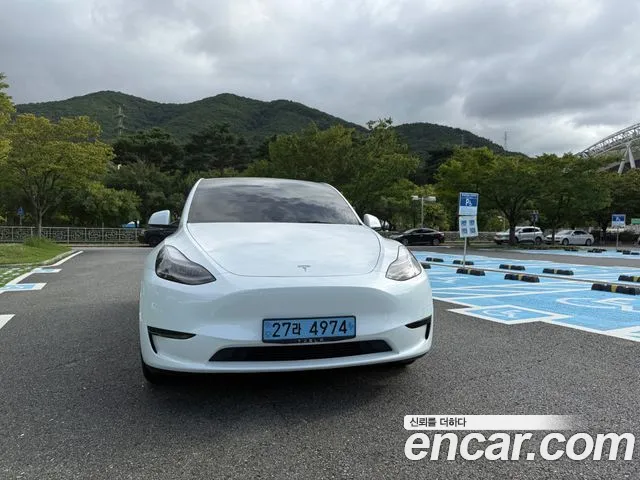 Tesla Model Y — Фото автомобиля 3