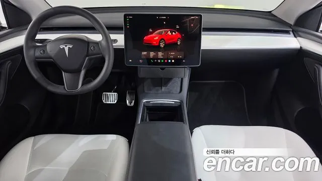 Tesla Model Y — Фото автомобиля 10