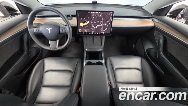 Tesla Model 3 — Фото автомобиля 10