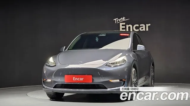 Tesla Model Y — Фото автомобиля 3