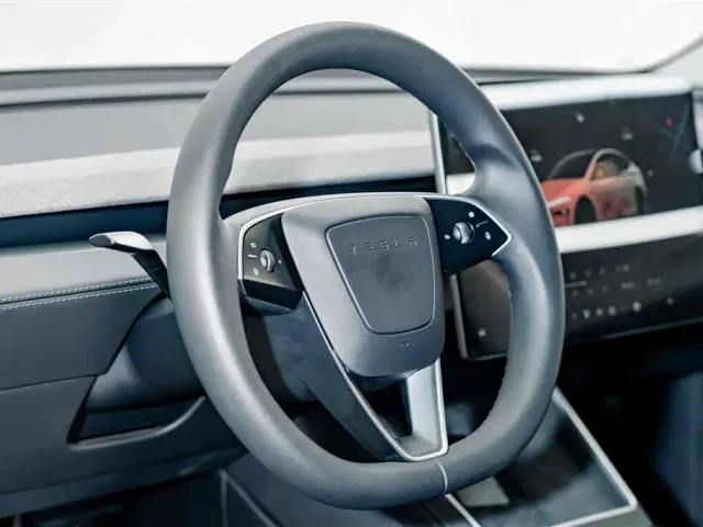 Tesla Model Y — Фото автомобиля 9