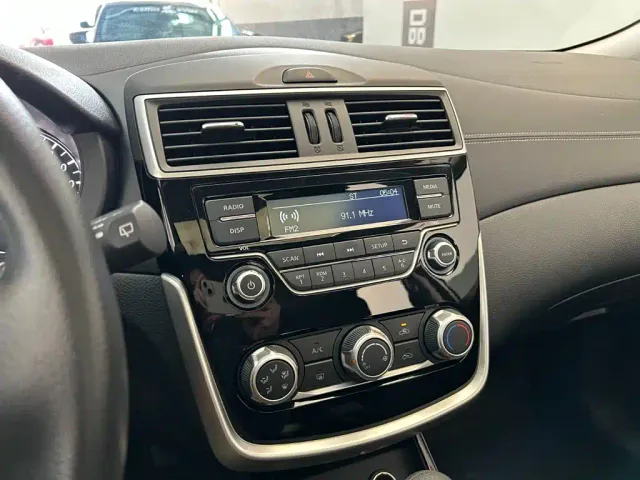 Nissan Tiida — Фото автомобиля 10
