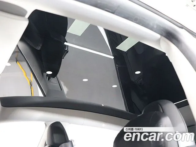 Tesla Model Y — Фото автомобиля 13