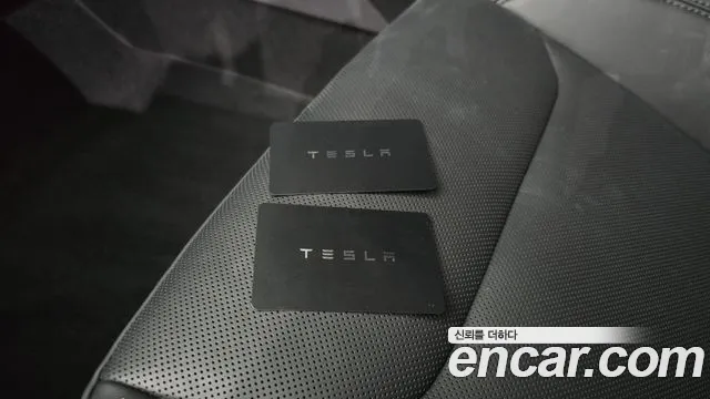Tesla Model 3 — Фото автомобиля 30