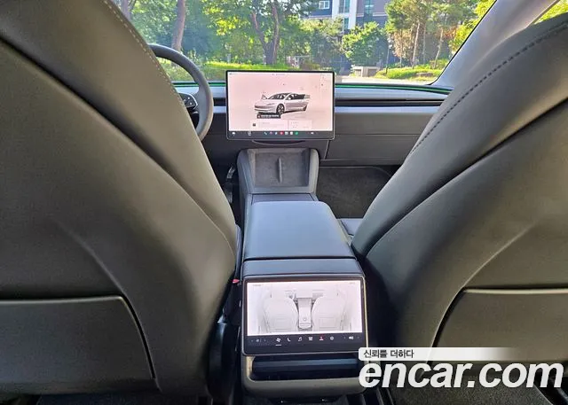 Tesla Model 3 — Фото автомобиля 10