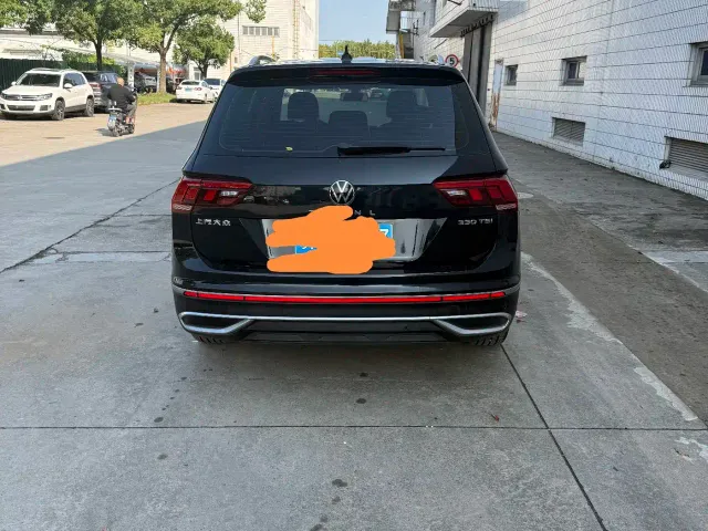 Volkswagen Tiguan L — Фото автомобиля 6
