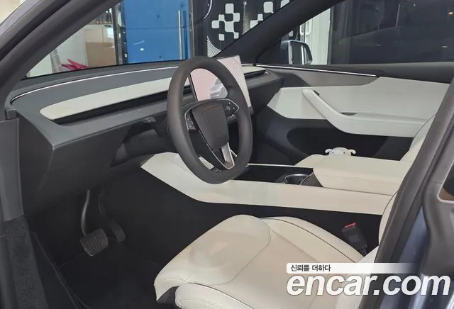 Tesla Model Y — Фото автомобиля 7