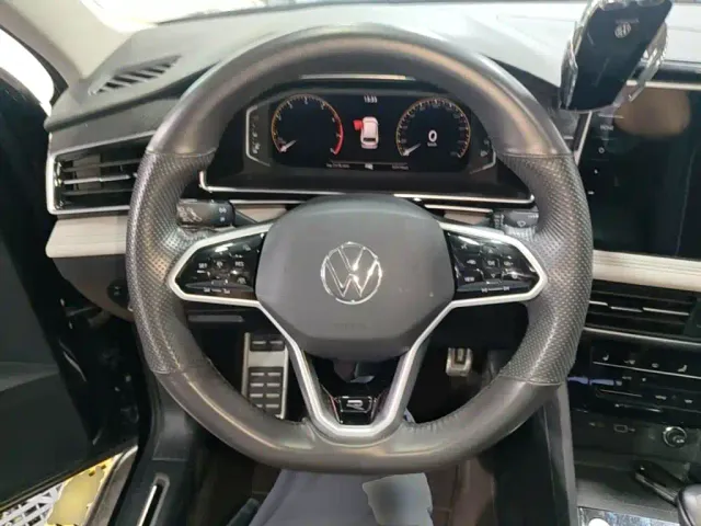 Volkswagen Tiguan L — Фото автомобиля 10