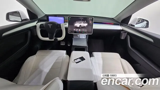 Tesla Model Y — Фото автомобиля 6