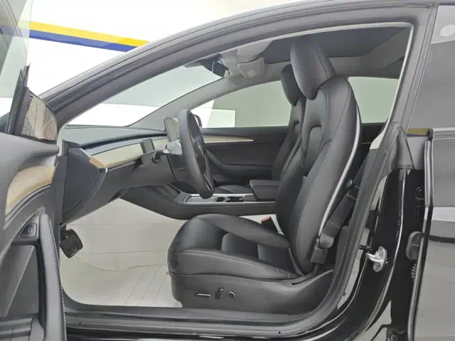 Tesla Model 3 — Фото автомобиля 9