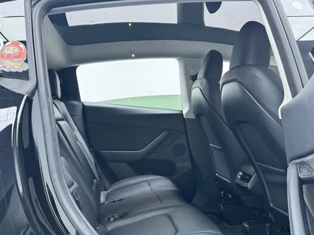 Tesla Model Y — Фото автомобиля 7