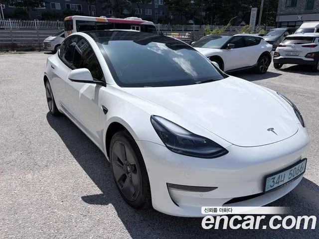 Tesla Model 3 — Фото автомобиля 2