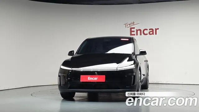 Tesla Model Y — Фото автомобиля 2
