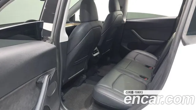 Tesla Model Y — Фото автомобиля 25