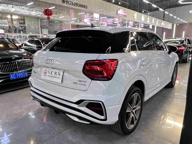 Audi Q2L — Фото автомобиля 9
