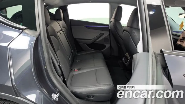Tesla Model Y — Фото автомобиля 11