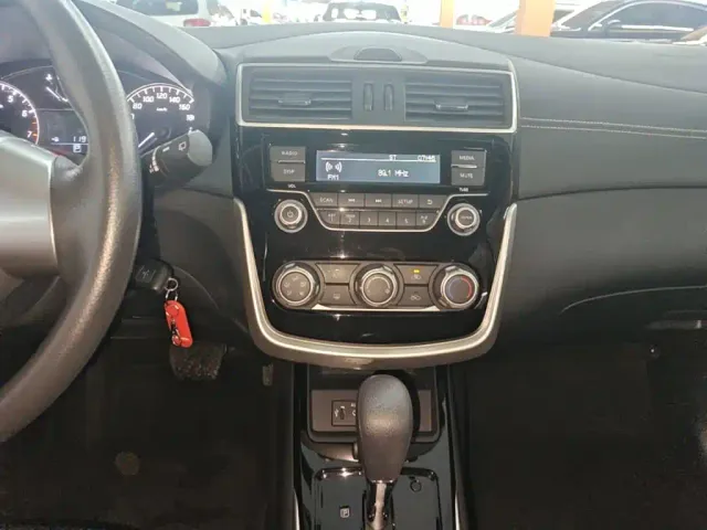 Nissan Tiida — Фото автомобиля 12