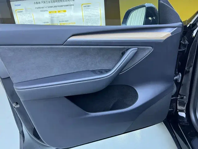 Tesla Model Y — Фото автомобиля 16