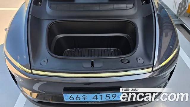 Tesla Model Y — Фото автомобиля 15