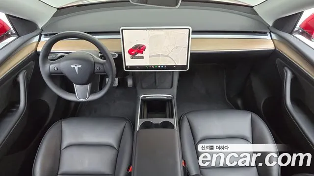 Tesla Model Y — Фото автомобиля 10